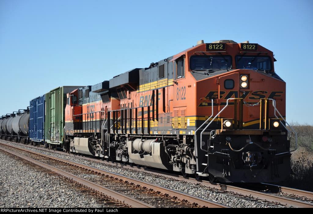 Eastbound manifest eases down the siding